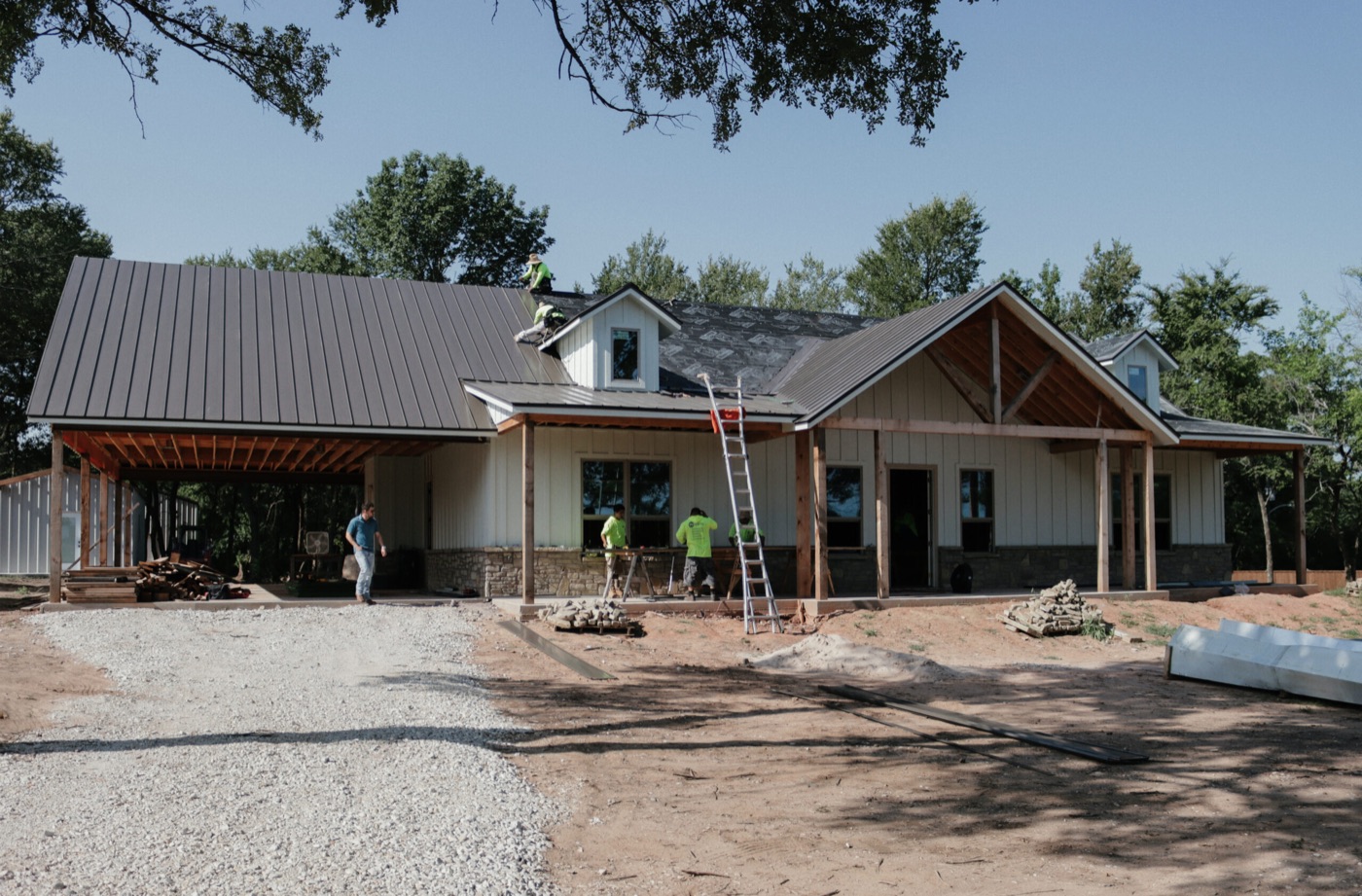 New standing seam metal roof on a custom farmhouse build